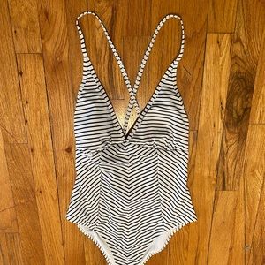 Size small white/black striped one piece never worn